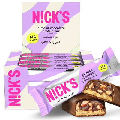 N!CK'S Almond Chocolate Protein Bar, 12-pack box, showing an unwrapped bar with visible almonds and chocolate filling. Highlights 14g protein and "no added sugar."
