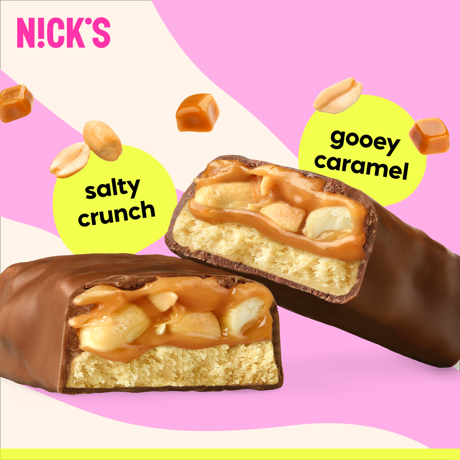 Close-up cross-section of a N!CK'S Salty Peanut Protein Bar, clearly showing salty crunch peanuts and gooey caramel filling coated in chocolate.