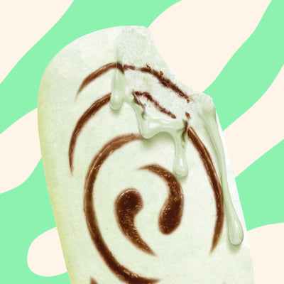N!CK'S Mint Chocolate Ice Cream Bar (4-pack box). The unwrapped bar shows mint ice cream with a chocolate swirl. Highlights 'no added sugar' and '80 calories/pop' for this frozen dessert.