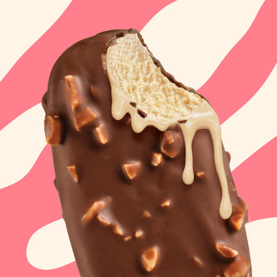 N!CK'S Peanut Chocolate Ice Cream Bar (4-pack box). The unwrapped bar shows vanilla/peanut ice cream coated in crunchy, peanut-filled chocolate. Highlights 'no added sugar' and '160 calories/pop' for a keto-friendly frozen novelty.