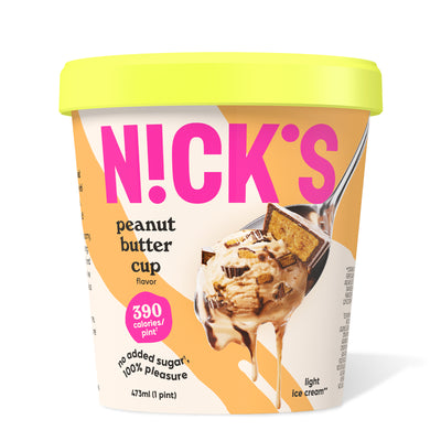 Pint of N!CK'S Peanut Butter Cup light ice cream. The label highlights 'no added sugar' and '390 calories/pint'. A spoon holds a scoop of peanut butter ice cream with visible peanut butter cup pieces and fudge swirl.