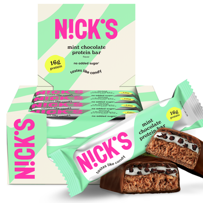 Box of N!CK'S Mint Chocolate Protein Bars (12-pack), with an unwrapped bar showing the interior layers. Highlights 16g protein and "no added sugar" for a keto snack.