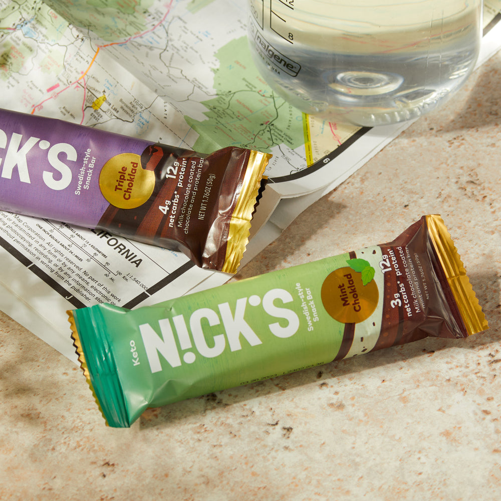 
            
                Load image into Gallery viewer, Nick&amp;#39;s protein bars on a table
            
        